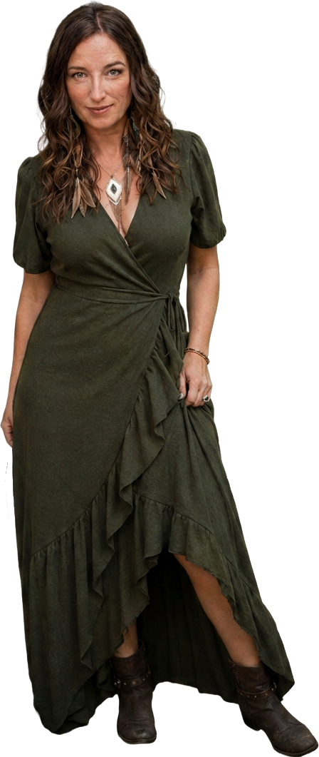 Tara Isis Gerris standing in an olive-green wrap dress
