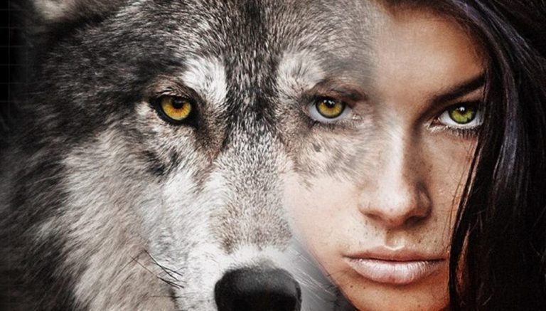 A grey wolf with amber eyes blending into the face of a dark-haired woman with the same golden gaze.